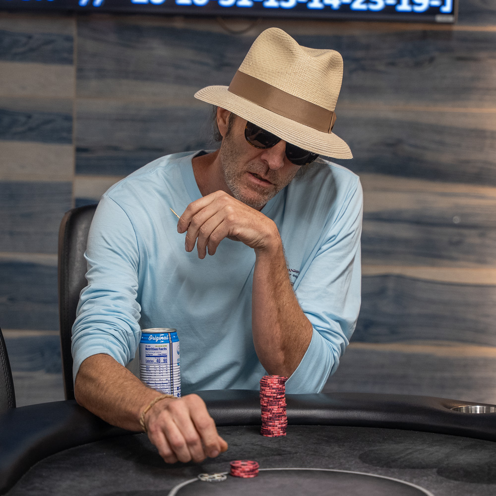 Poker player in a hat